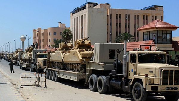 File picture shows an Egyptian miltary convoy in the North Sinai provincial capital El-Arish. (AFP/File) File picture shows an Egyptian miltary convoy in the North Sinai provincial capital El-Arish. (AFP/File)