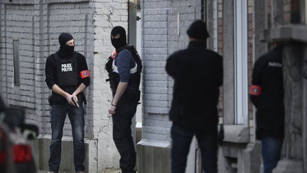 Belgian police conduct raids on 15 March, 2016. (AFP/File)