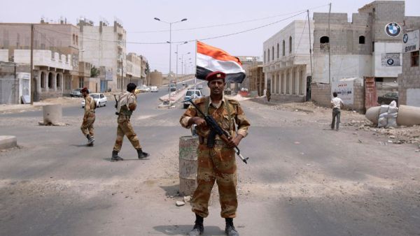 A Yemeni army officer looks on while standing at a checkpoint in Sanaa, Yemen. (AFP/File) A Yemeni army officer looks on while standing at a checkpoint in Sanaa, Yemen. (AFP/File)
