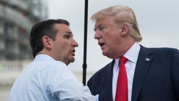 Donald Trump is greeted on stage by Ted Cruz before speaking at a rally against the Iran nuclear deal in Washington on Sept. 9, 2015. (AFP/File)