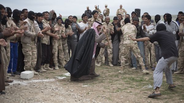 Bedouin volunteers dance as they relax after a day’s training in Iraqi Kurdistan. (Photo/Matt Cetti Roberts)