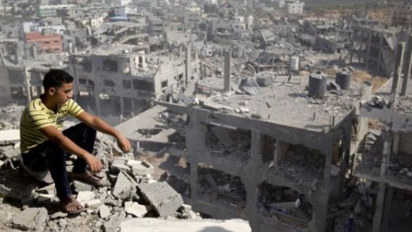 A young Palestinian overlooks Gaza city. (AFP/File)