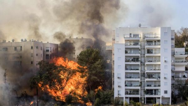 Fires raged through Haifa, causing the city to be evacuated. (AFP/File) 