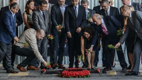 Consuls of European countries lay cloves and roses at the explosion site at Ataturk airport International terminal on July 1, 2016 three days after a suicide bombing and gun attack targeted Istanbuls Ataturk airport, killing 44 people. (AFP/File)  Consuls of European countries lay cloves and roses at the explosion site at Ataturk airport International terminal on July 1, 2016 three days after a suicide bombing and gun attack targeted Istanbuls Ataturk airport, killing 44 people. (AFP/File)