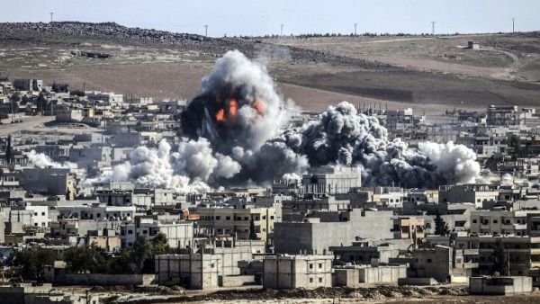 Smoke and flames billow following an explosion in the Syrian town of Kobani, October 22. (AFP/File)