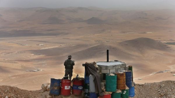 In this Sunday June 19, 2016 photo, a Lebanese army soldier stand guards at one of the frontline hills where they are fighting militants, at the edge of the town of Arsal, on the Syrian border, in northeast Lebanon. (File photo)