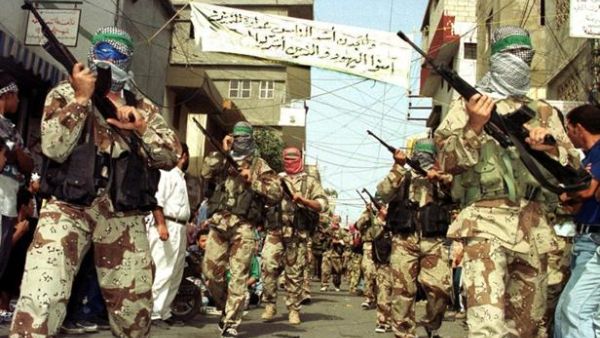 Gunmen march through Sidon's Ain al-Helweh camp. (AFP/Mahmoud Zayat) Gunmen march through Sidon's Ain al-Helweh camp. (AFP/Mahmoud Zayat)