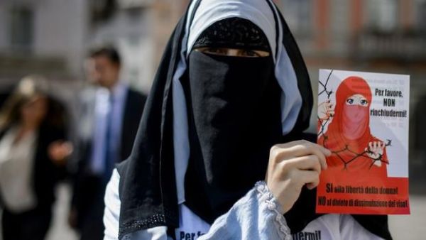 The law states that clothing which obscures or covers the face cannot be worn in government offices, schools, cultural institutions, and public places of recreation. (AFP/File)