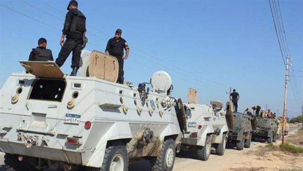 Egyptian security forces stand by their armored personnel carriers in North Sinai. (AFP/File)