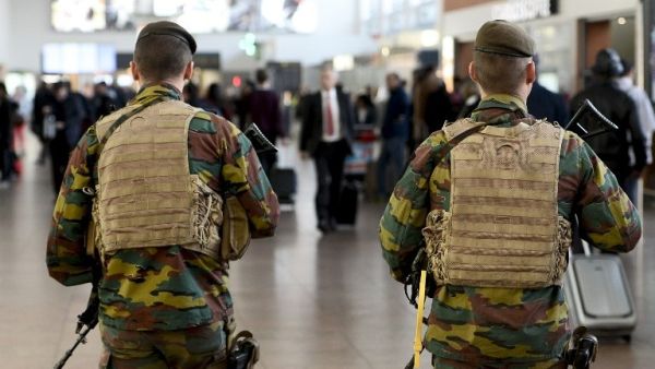 Military police patrol the Brussels Airport in Zaventem, eastern Brussels, November 18, 2015. (AFP/Belga/Dirk Waem)