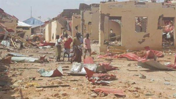 People gather at the site of car bomb attacks in the town of Galkayo, in the semi-autonomous Puntland region of Somalia, August 21, 2016. (File photo)