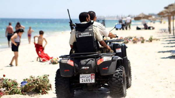 Tunisian security forces patrol a beach in Sousse. (AFP/File) Tunisian security forces patrol a beach in Sousse. (AFP/File)