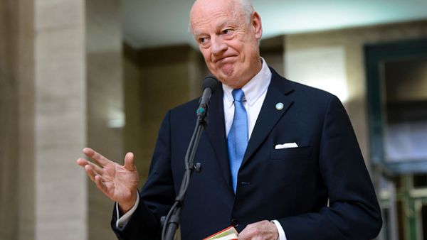 UN envoy for Syria Staffan de Mistura gestures as he speaks to journalists during ongoing peace talks with representatives of the Syrian regime. (AFP/File)