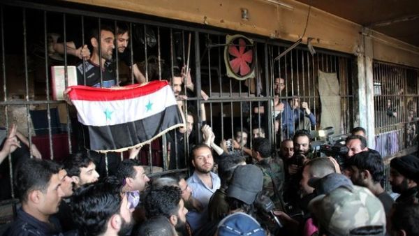 A handout image from the Syrian state news agency shows prison inmates. (AFP/SANA)
