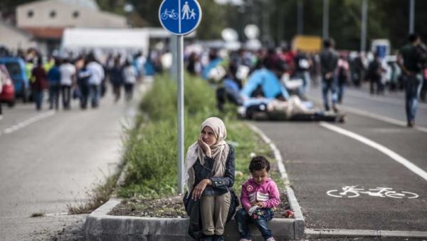 Refugees in Greece, Iraq, the island of Nauru, and on the Syria-Jordan border are "in dire need of a home," while others in countries such as Kenya and Pakistan face "growing harassment from governments," Amnesty said in its report. (AFP/Armend Nimani)