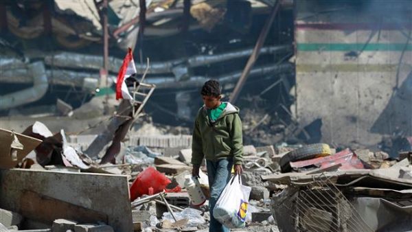 A Yemeni boy walks amid the ruins of a school and a bowling club hit by Saudi airstrike in the capital Sana'a, on February 12, 2016. (AFP/File)