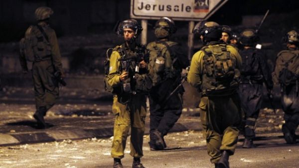 Ten thousand Israeli soldiers were deployed to different West Bank (AFP/File Photo)