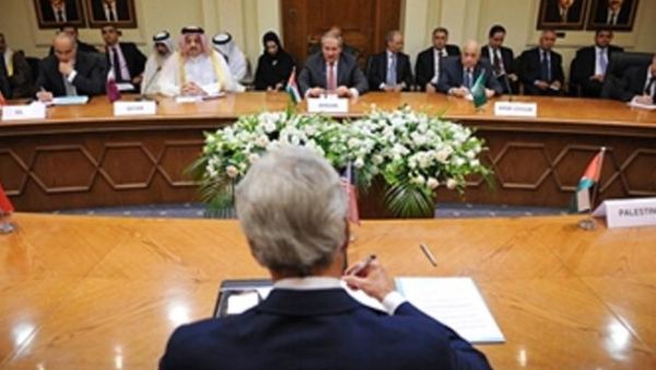 US Secretary of State John Kerry (back) meets with the Arab League Peace Initiative at the Ministry of Foreign Affairs on July 17, 2013 in Amman. Kerry is on his sixth visit to the region as he seeks to persuade the Israelis and Palestinians to resume direct negotiations frozen for almost three years. (MANDEL NGAN/AFP/Getty Images)