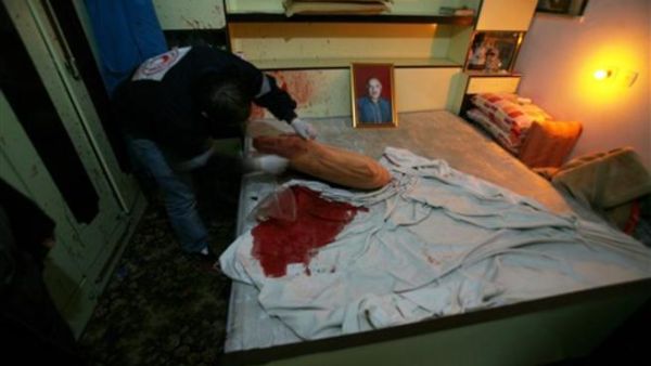 lالسرير الذي قتل عليه المسن الفلسطيني في الخليل/أ.ف.ب