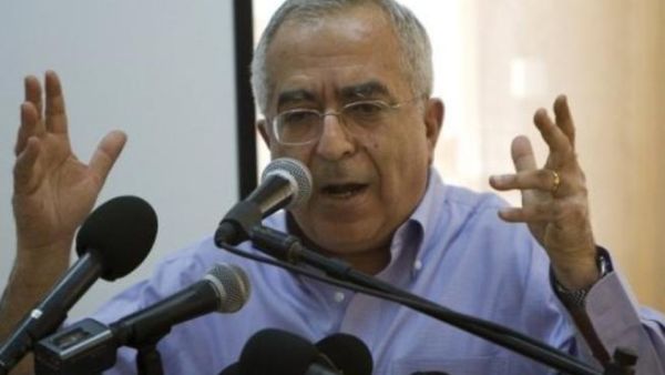 Salam Fayyad - who was recently accused of squandering public funds - affirms: "The government has decided to pay employees half their salary due to the financial crisis in the Palestinian Authority" 