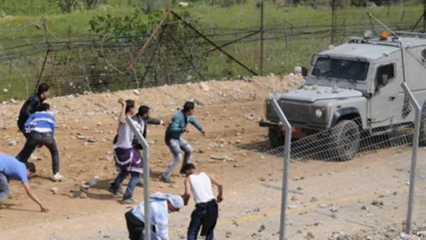 جانب من المواجهات بين اللاجئين الفلسطينيين ودورية إسرائيلية على حدود الجولان المحتل