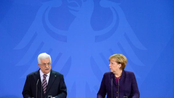 German Chancellor Angela Merkel and Palestinian President Mahmoud Abbas give a press conference on October 18, 12013 at the Chancellery in Berlin .(Image credit: AFP)