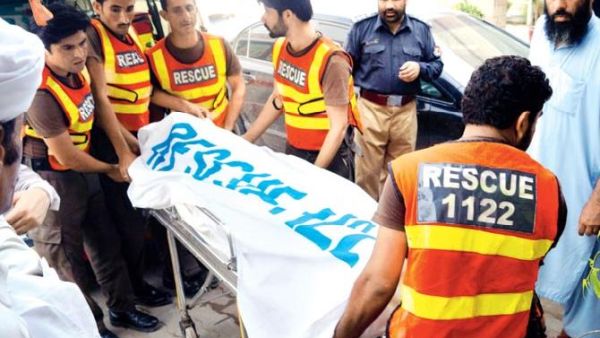 Rescue workers move the body of Ikramullah Gandapur. (AFP/ File)