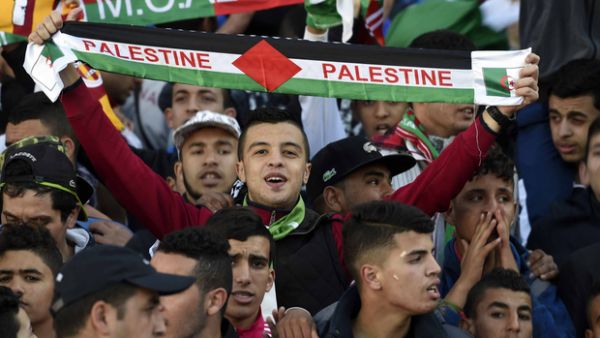 Algeria and Palestine are so close that during football matches, fans support both teams. (AFP/File)