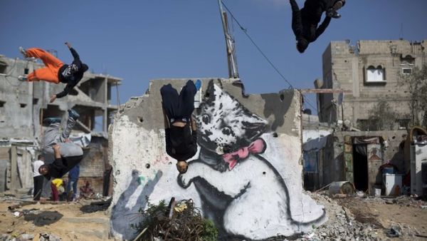 Israeli signboards banning entry of Israeli citizens to Palestinian cities are visible at the entrance to every Palestinian city. (AFP/Mohamed Abed)