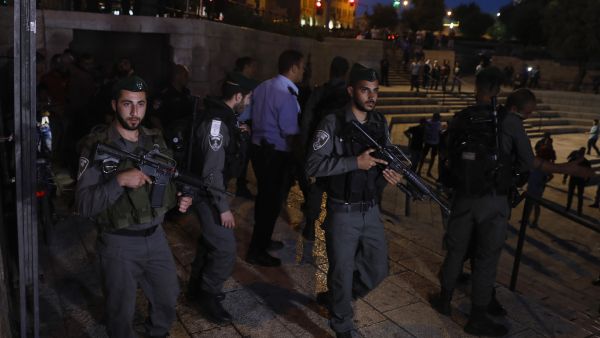 Israeli border police patrol the area where Fatima Afif Abd al-Rahman Hjeiji was killed on May 7. (AFP/Menahem Kahana)