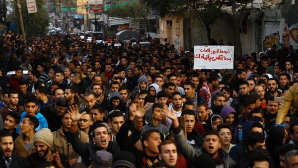 Palestinians protest against the ongoing electricity crisis in Jabalia refugee camp in the northern Gaza Strip on January 12, 2017. (AFP/Mohammed Abed)