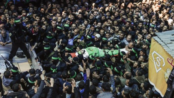 The body of Palestinian Islamist movement Hamas' official Mazen Faqaha is carried by members of the Ezzedine al-Qassam Brigades, the military wing of Hamas, during his funeral in Gaza city on March 25, 2017. (AFP/Mahmud Hams) The body of Palestinian Islamist movement Hamas' official Mazen Faqaha is carried by members of the Ezzedine al-Qassam Brigades, the military wing of Hamas, during his funeral in Gaza city on March 25, 2017. (AFP/Mahmud Hams)
