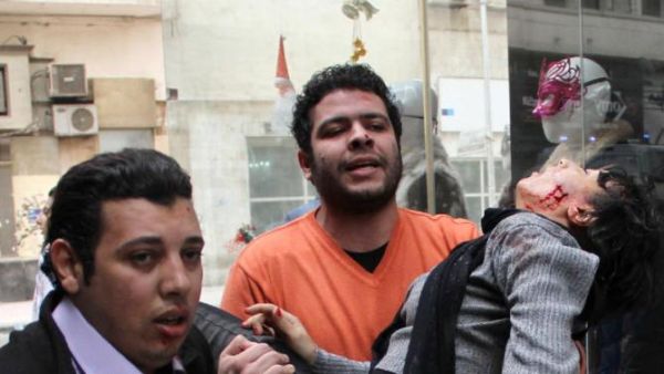 A picture taken on January 24, 2015 shows Egyptian Shaima al-Sabbagh after she was shot during clashes with police. (AFP/Emad El-Gebaly)