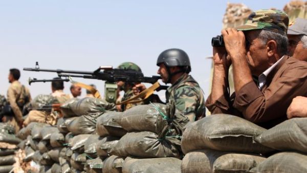 The central government on Friday began to deploy forces in the vicinity of Taza and Bashir villages, some 10 kilometers south of Kirkuk city after the withdrawal of the Peshmerga forces in the night (AFP/File)