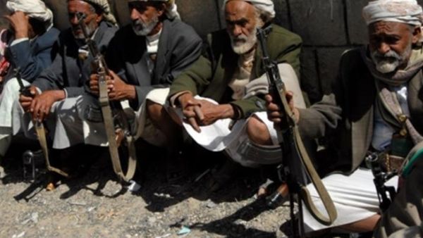 Elderly Yemeni tribesmen sit holding their weapons during a tribal ceremony in Khamer city, Amran governorate, 75 km north of the Yemeni capital Sanaa on January 22, 2008