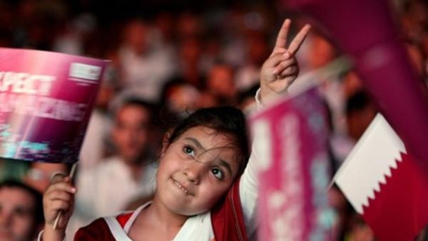A Qatari girl celebrates in Doha after the tiny Gulf state was chosen to host the 2022 World Cup on December 2, 2010