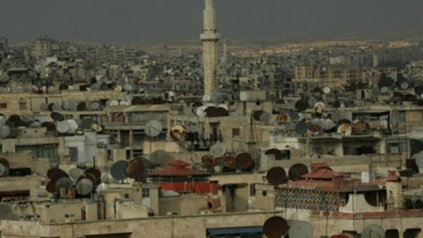 A picture taken 17 March 2006 shows a general view of the Syrian city of Aleppo, 350 kms north of Damascus, with satellite dishes dominating the roofs of its houses and buildings. 