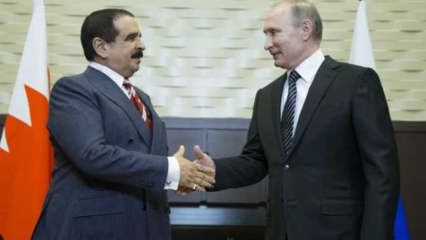 Russian President Vladimir Putin shakes hands with Bahrain's King Hamad bin Isa Al-Khalifa during a meeting in Sochi. (AFP)