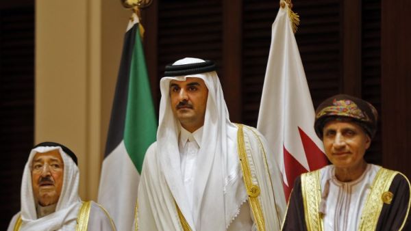 Qatari Emir Sheikh Tamim bin Hamad Al Thani (center) with his Kuwaiti and Omani counterparts at the GCC summit. (file photo)