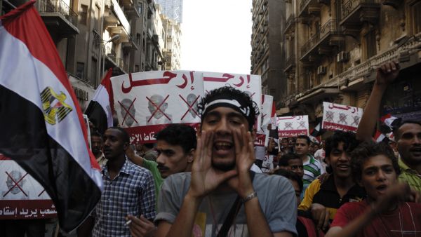 Unidentified anti-Muslim Brotherhood protester in Tahrir Square shout slogans calling for Mohammad Morsi's resignation on June 30, 2013 in Cairo, Egypt (Shutterstock/File Photo)