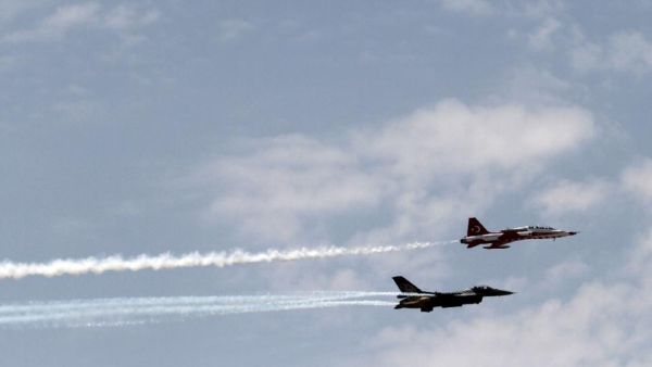 There's a fierce political battle brewing between Russia and Turkey over the fate of the Russian jet and how it got there. Twitter, meanwhile is bringing the debate online. (AFP/File)