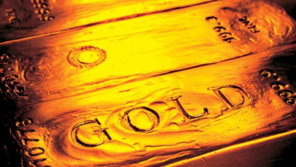 Gold hit a record $1,880 (Dh6,905) an ounce on Friday as European stock markets fell