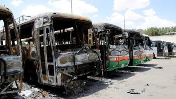 Buses allegedly torched by disgruntled Binladin construction workers. (Telesurtv.net)