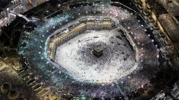Muslim worshippers pray at the Kaaba, Islam's holiest shrine, at the Grand Mosque in Saudi Arabia's holy city of Mecca on June 23, 2017, during the last Friday of the holy month of Ramadan. (Bandar Aldandani/AFP)