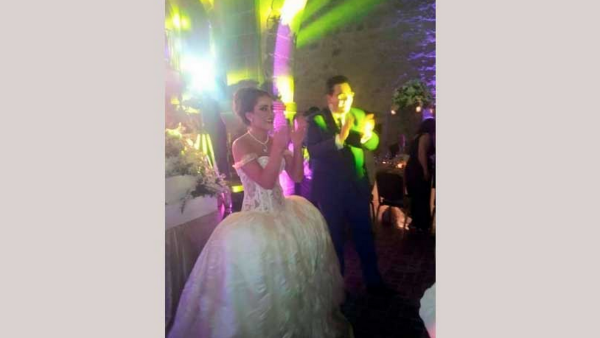 Dima dances the night away with her new hubby Humam. (Screenshot)