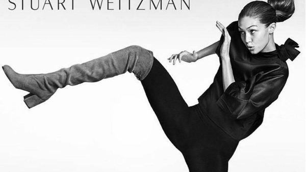 The top model put on an athletic display in thigh-high boots for Stuart Weitzman's latest campaign. (Instagram)