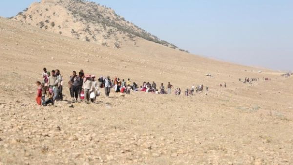 Sinjar mountain and the surrounding town remains a contested area, sought by Iraqi Kurdish authorities, Yazidis, the Iraqi government and Daesh. (AFP/File)