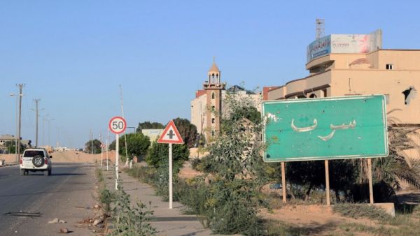 A sign welcomes travelers to Sirte, Libya. (AFP/Mahmud Turkia)
