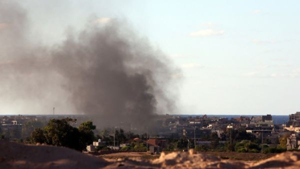 Smoke from rocket fire rises in Sirte, Libya. (AFP/File)