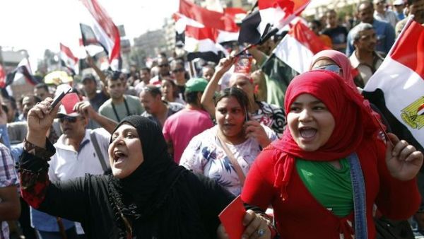 Women call for the ouster of Egyptian President Mohamed Morsi during June 30 mass protests (AFP)